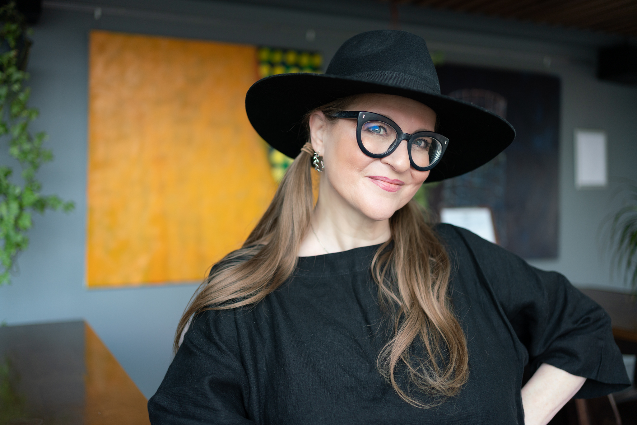 Jacki Vause wearing a black hat and glasses